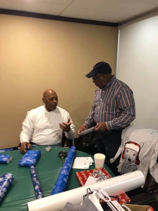 CCCoM wrapping Gifts for our Adopted Families