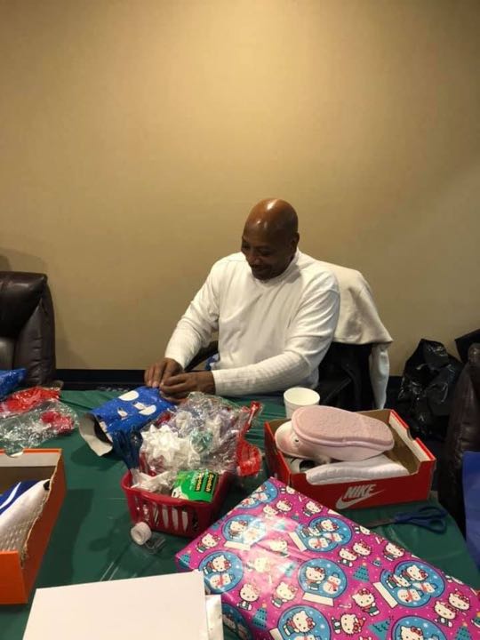 CCCoM wrapping Gifts for our Adopted Families