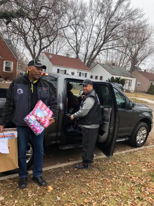 CCCoM wrapping Gifts for our Adopted Families