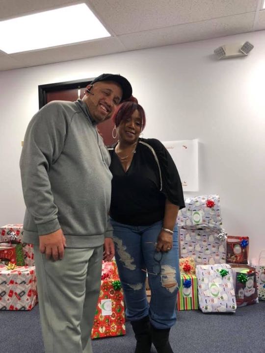 CCCoM wrapping gifts for our Adopted Families "Merry Christmas"