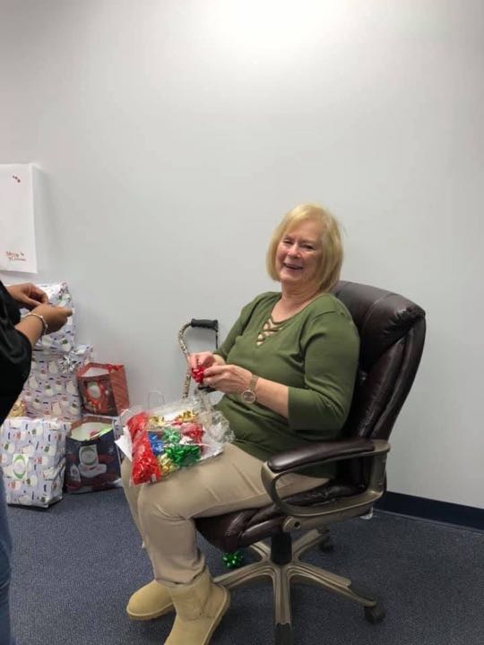 CCCoM wrapping gifts for our Adopted Families "Merry Christmas"